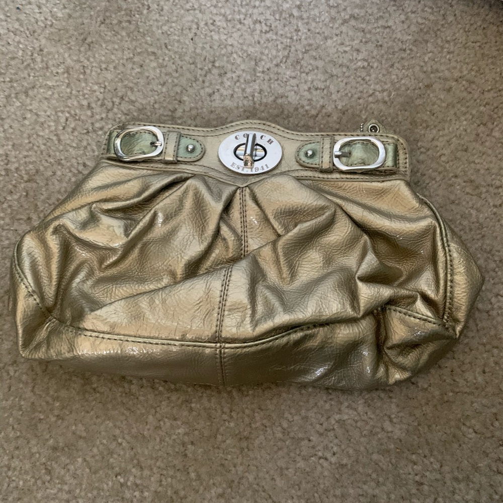 Clutch with a strap